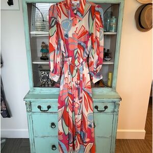 Alexis Geometric Belted Dress with full sleeves.